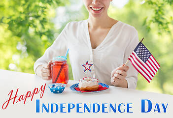 Image showing happy woman celebrating american independence day