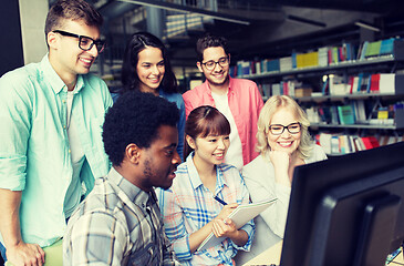 Image showing international students with computers at library