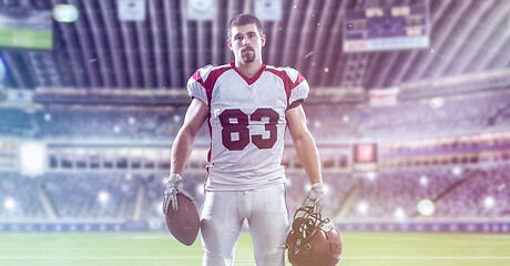Image showing American Football Player isolated on big modern stadium field