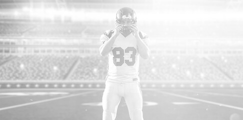 Image showing American Football Player isolated on big modern stadium field