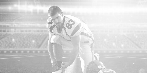 Image showing American Football Player on big modern stadium field