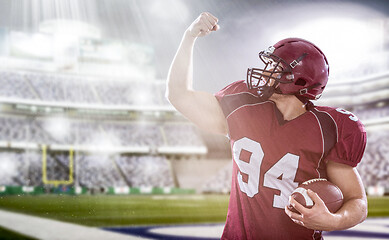 Image showing american football player celebrating touchdown