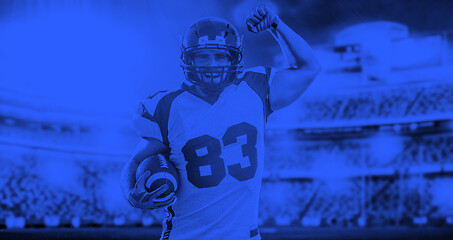 Image showing duo toned american football player in  arena at night