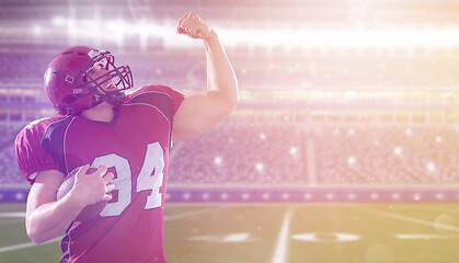 Image showing american football player celebrating touchdown