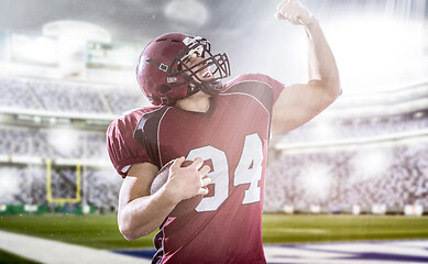 Image showing american football player celebrating touchdown