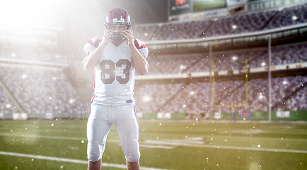 Image showing American Football Player isolated on big modern stadium field