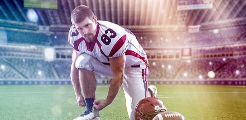 Image showing American Football Player on big modern stadium field