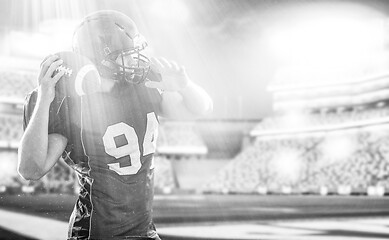 Image showing american football player throwing ball