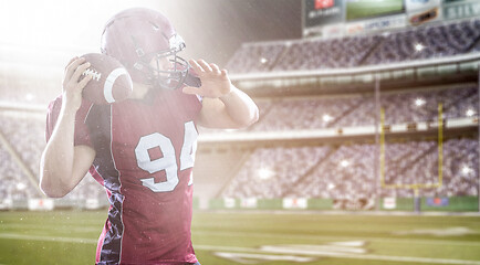 Image showing american football player throwing ball