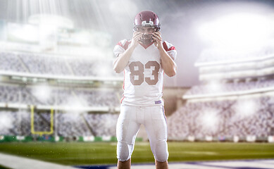 Image showing American Football Player isolated on big modern stadium field