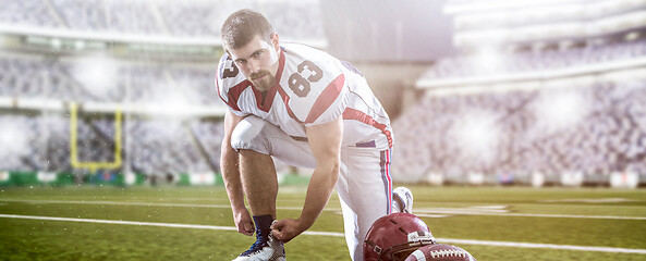 Image showing American Football Player on big modern stadium field