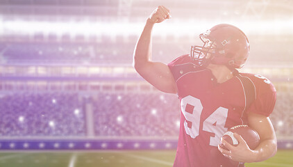 Image showing american football player celebrating touchdown