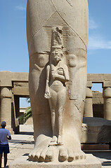 Image showing Detail of egyptian statue of Pharaoh Ramses II with small statue