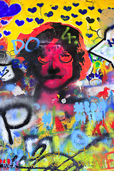 Image showing Detail of bright colorful John Lennon's wall with graffiti in Pr