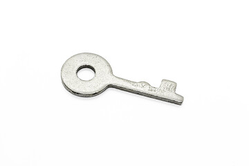 Image showing Simple metallic key on white background