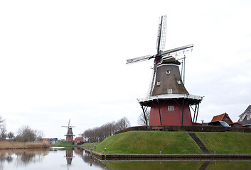 Image showing Dokkum, the Netherlands on December 26, 2019: Canal and windmill