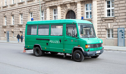 Image showing BERLIN, GERMANY - DECEMBER 30, 2019: Empty green police van park