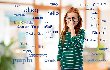 Image showing smiling red haired student girl in glasses