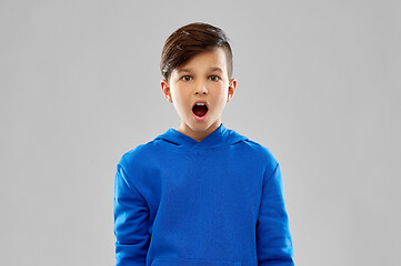 Image showing shocked boy in blue hoodie