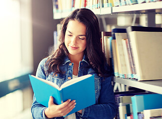 Image showing high school student girl reading book at library