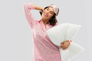 Image showing woman with pillow in pajama and eye sleeping mask