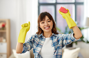 Image showing happy asian woman with sponge cleaning at home