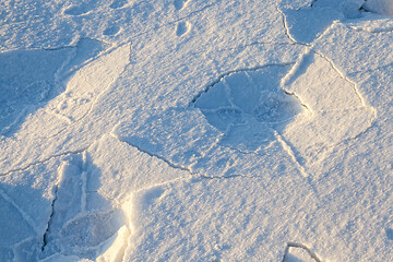 Image showing traces of shoes in the snow close-up