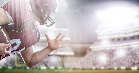 Image showing American football Player running with the ball