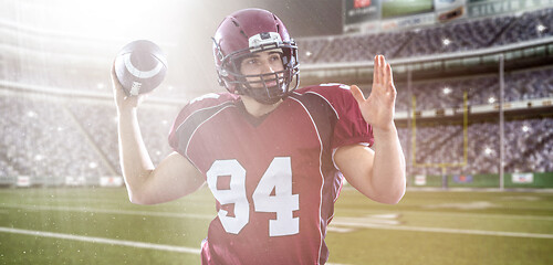 Image showing american football player throwing ball