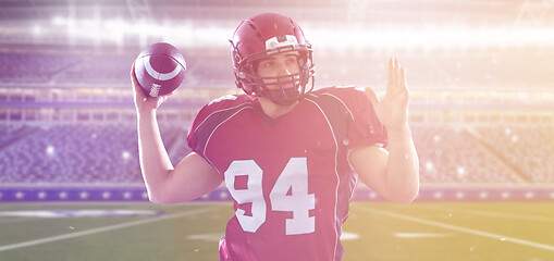 Image showing american football player throwing ball