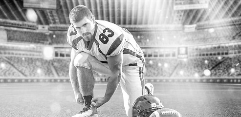 Image showing American Football Player on big modern stadium field