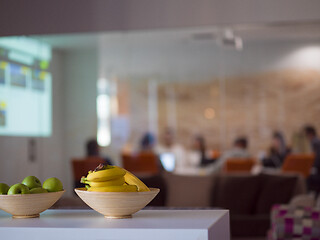 Image showing Two bowl with with bananas and apples