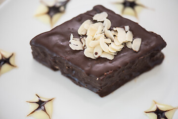 Image showing chocolate dessert pie with nuts