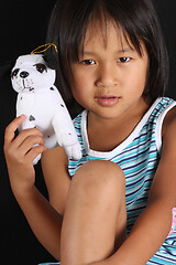 Image showing Portrait of a young cute girl looking at the camera