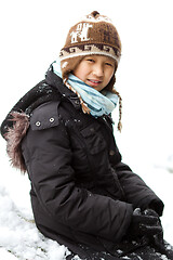 Image showing Girl playing in the snow in winter in denmark