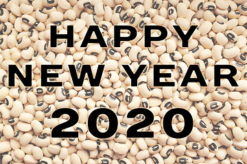 Image showing Happy New Year 2020 text over black eyed peas