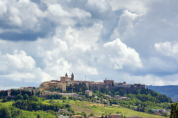 Image showing Camerino in Italy Marche over colourful fields