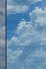 Image showing Clouds reflected in windows of skyscraper