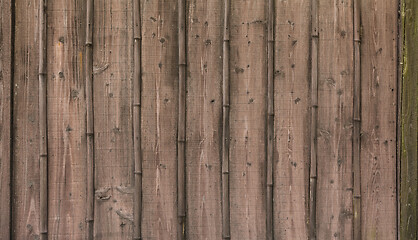 Image showing Brown wood texture background divided on vertical planches