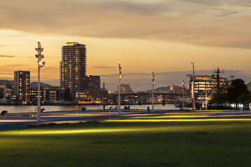 Image showing Nagasaki Seaside Park near Dejima wharf shopping and restaurant area , Japan. at sunset