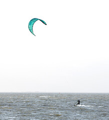 Image showing Kitesurfing on the waves