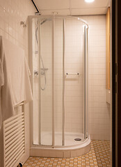 Image showing Heated towel rack in an old bathroom