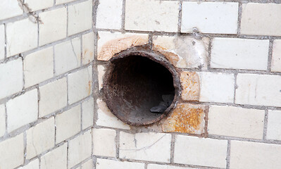 Image showing Old small tiles square shape on a wall