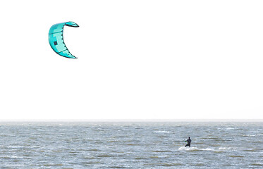 Image showing Kitesurfing on the waves