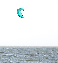 Image showing Kitesurfing on the waves