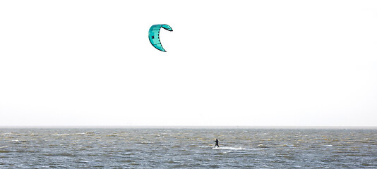 Image showing Kitesurfing on the waves