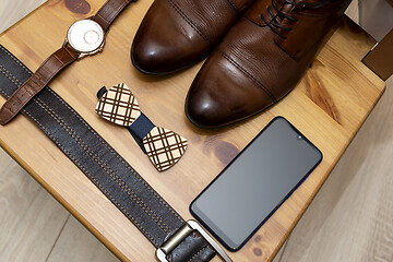 Image showing Men's accessories: shoes, watches, belt, smartphone and bow tie, concept