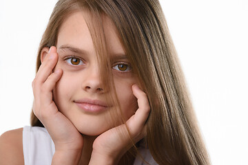 Image showing Portrait of a beautiful teenage girl, Caucasian appearance, with long brown hair