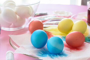 Image showing Painting in different colors of eggs for Easter