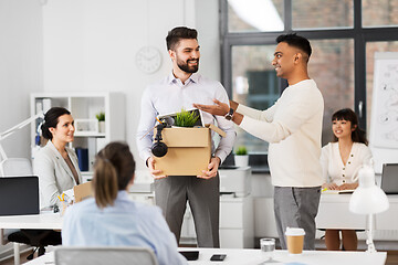Image showing new male employee meeting colleagues at office